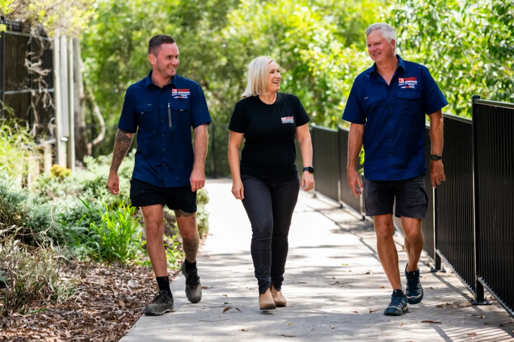 Foundation Solutions team with a homeowner