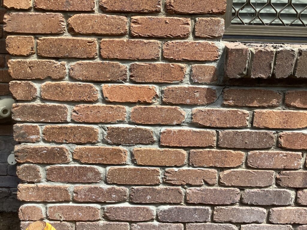Screw pile underpinning repair after failed resin injection
